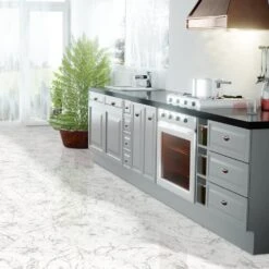 Liberty Floors Carrara Marble - Lustre Stone 8mm High Gloss Laminate Flooring (223773) -Flooring Discount Store carrara marble lustre stone 8mm high gloss laminate flooring 223773 p90003 207840 image