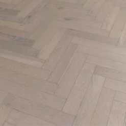 Liberty Floors Pebble Grey Oak - Herringbone Parquet 14mm Engineered Real Wood Flooring (219386) -Flooring Discount Store pebble grey oak herringbone parquet 14mm engineered real wood flooring 219386 p85834 201395 image