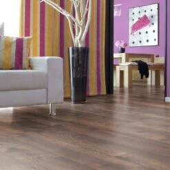 Kronotex Pettersson Dark Oak - Amazone 10mm Laminate Flooring (160229) -Flooring Discount Store pettersson dark oak amazone 10mm laminate flooring 160229 p54218 143286 image